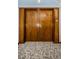 Wooden double front door with gold hardware and unit number 514 at 1600 Gulf Blvd # 514, Clearwater Beach, FL 33767