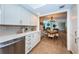 Spacious kitchen with white countertops and cabinets, tile floors, and sightlines into living spaces at 1600 Gulf Blvd # 514, Clearwater Beach, FL 33767