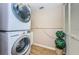Convenient laundry room with stackable washer and dryer, and easy access for laundry chores at 1600 Gulf Blvd # 514, Clearwater Beach, FL 33767