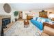 Cozy living room with warm fireplace, hardwood floors, and comfortable decor at 1600 Gulf Blvd # 514, Clearwater Beach, FL 33767
