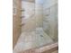 Elegant walk-in shower with glass door and tiled surround, providing a luxurious bathing experience at 1600 Gulf Blvd # 514, Clearwater Beach, FL 33767