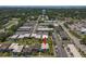 Aerial view of the condo community with a large water tower in the distance at 1799 N Highland Ave # 180, Clearwater, FL 33755