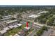 Aerial view of the condo community near shopping, parking, and green spaces at 1799 N Highland Ave # 180, Clearwater, FL 33755