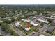 Aerial view of a condo community surrounded by lush greenery and convenient parking at 1799 N Highland Ave # 180, Clearwater, FL 33755