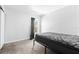 Minimalist bedroom with a simple bed frame and a window at 1799 N Highland Ave # 180, Clearwater, FL 33755