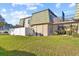 Exterior view of the condo building and lawn at 1799 N Highland Ave # 180, Clearwater, FL 33755