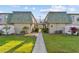 Exterior of condo building with well-kept lawns at 1799 N Highland Ave # 180, Clearwater, FL 33755