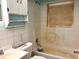 Bathroom showcasing a tub, toilet, sink, and cabinetry at 1810 Alcorn Rd, Valrico, FL 33596