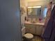 Cozy bathroom featuring a vanity with cabinet storage and an integrated sink at 18675 Us Highway 19 N # 318, Clearwater, FL 33764