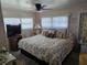 Cozy bedroom featuring a comfortable bed, neutral decor, and ample natural light at 18675 Us Highway 19 N # 318, Clearwater, FL 33764