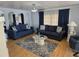Bright and airy living room showcasing dual sofas, a glass coffee table, and neutral decor at 18675 Us Highway 19 N # 318, Clearwater, FL 33764