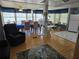 Inviting living room with large windows, hardwood floors, and comfortable seating areas at 18675 Us Highway 19 N # 318, Clearwater, FL 33764