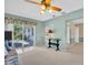 Inviting living room with access to the patio, perfect for relaxing and entertaining guests at 2113 Malcolm Dr, Palm Harbor, FL 34684
