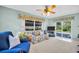 Comfortable living room filled with natural light, complemented by stylish furnishings and an open layout at 2113 Malcolm Dr, Palm Harbor, FL 34684
