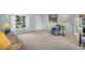 Cozy living room with neutral colors, inviting seating, and lots of natural light at 2113 Malcolm Dr, Palm Harbor, FL 34684