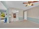 Open-concept living space connects the kitchen and living room, creating a bright and inviting atmosphere at 2113 Malcolm Dr, Palm Harbor, FL 34684