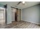 Bedroom with custom closet and laminated floors offers spacious and modern living at 2380 Shelly Dr # B, Palm Harbor, FL 34684
