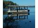 Pontoon boat with passengers on the lake at 2380 Shelly Dr # B, Palm Harbor, FL 34684