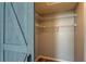 Spacious walk-in closet with custom shelving provides ample storage space for organization at 2380 Shelly Dr # B, Palm Harbor, FL 34684