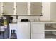 Laundry room featuring a washer and dryer, utility sink and storage shelving at 2380 Shelly Dr # B, Palm Harbor, FL 34684