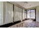 Sunroom with light-filtering blinds, windows and ceramic tile flooring at 2380 Shelly Dr # B, Palm Harbor, FL 34684