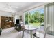 Dining area with a view of the backyard and an office area at 2461 Rhodesian Dr # 37, Clearwater, FL 33763