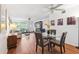 Open-concept living and dining area with natural light and wood flooring at 2461 Rhodesian Dr # 37, Clearwater, FL 33763