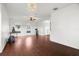 Open concept living room with hard wood floors and ample natural light at 2832 Brinley Dr, Trinity, FL 34655