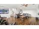 Spacious living room with hardwood floors and comfortable seating area at 2832 Brinley Dr, Trinity, FL 34655