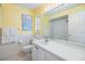 Clean bathroom featuring a vanity, mirror, and a well-maintained shower/tub combination at 3105 Avocet Pl, Safety Harbor, FL 34695