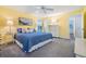 Bright and airy bedroom with a cozy bed, soothing colors, and lots of natural light at 3105 Avocet Pl, Safety Harbor, FL 34695