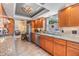 Modern kitchen featuring stainless steel appliances, granite countertops, and ample cabinet space at 3105 Avocet Pl, Safety Harbor, FL 34695