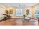 Relaxing living room with musical instruments, and bright window to enjoy music and natural light at 3105 Avocet Pl, Safety Harbor, FL 34695
