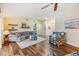 Spacious living area boasting hardwood floors, plush seating, and abundant natural light at 3105 Avocet Pl, Safety Harbor, FL 34695