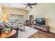 Comfortable living room with natural light, hardwood floors, and view to the kitchen at 3105 Avocet Pl, Safety Harbor, FL 34695