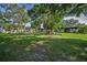 Expansive backyard with well-maintained lawn, offering plenty of space for recreation and enjoying nature at 3126 Highlands Blvd # 3126, Palm Harbor, FL 34684