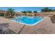 Spacious community pool with comfortable lounge chairs, ideal for enjoying sunny days at 3126 Highlands Blvd # 3126, Palm Harbor, FL 34684