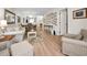 Spacious living room featuring a cozy seating arrangement, elegant dining area, and stylish decor at 3126 Highlands Blvd # 3126, Palm Harbor, FL 34684
