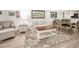 Comfortable living room featuring a plush sofa, patterned rug, and classic decor at 3126 Highlands Blvd # 3126, Palm Harbor, FL 34684