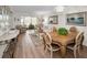 Bright and airy living room showcases a cozy seating area and stylish dining set at 3126 Highlands Blvd # 3126, Palm Harbor, FL 34684