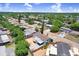 Aerial view of a residential neighborhood featuring tree lined streets and well maintained homes at 3247 Kimberly Oaks Dr, Holiday, FL 34691