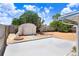 Backyard featuring shed and desert landscaping at 3247 Kimberly Oaks Dr, Holiday, FL 34691