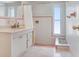 Bathroom featuring a shower and a sink with cabinets at 3247 Kimberly Oaks Dr, Holiday, FL 34691