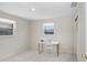 Bright bedroom with carpeted floor, large window, and closet at 3247 Kimberly Oaks Dr, Holiday, FL 34691