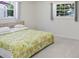Cozy bedroom featuring natural light and comfortable ambiance at 3247 Kimberly Oaks Dr, Holiday, FL 34691