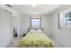 Bright bedroom offering closet space and natural light from a window at 3247 Kimberly Oaks Dr, Holiday, FL 34691