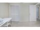 Bedroom featuring closet and additional entrance door at 3247 Kimberly Oaks Dr, Holiday, FL 34691