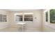 Inviting dining area with natural light from multiple windows at 3247 Kimberly Oaks Dr, Holiday, FL 34691