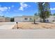 Charming single-story home featuring a one car garage, well-maintained landscaping with a mature tree at 3247 Kimberly Oaks Dr, Holiday, FL 34691
