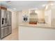 Modern kitchen boasting stainless steel appliances and ample counter space at 3247 Kimberly Oaks Dr, Holiday, FL 34691